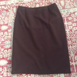 Brown lined pencil skirt. No snags, rips or spots